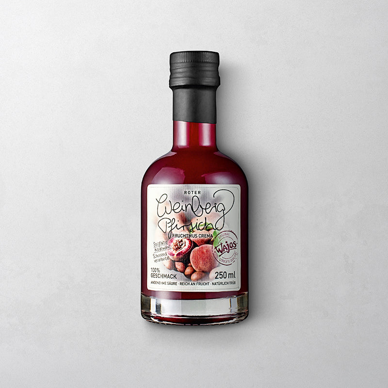 Roter Weinbergpfirsich Crema mit Fruchtmus in der 250 ml Flasche.