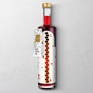 Wajos Adventskalender Flasche gefüllt mit Gewürzpflaumen Likör