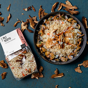 PIlz Risotto dargestellt auf dem Teller