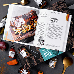 Kochbuch aufgeschlagen - Chimi-Churri-Spanferkel-Rezept