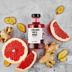 Pink Grapefruit & Ingwer Tonic Sirup dargestellt mit Aromen